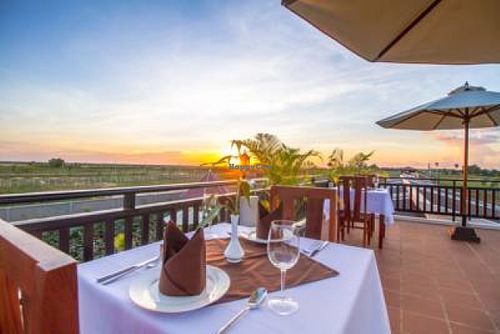 Over the pool we have panoramic rooftop dinning of our 100% vegetarian food cooked as you like it...Brown rice or fluffy white basmati rice with your  deliciously cooked meals.  at Jerry's Kitchen at Ry's Lotus Resort in Siem Reap