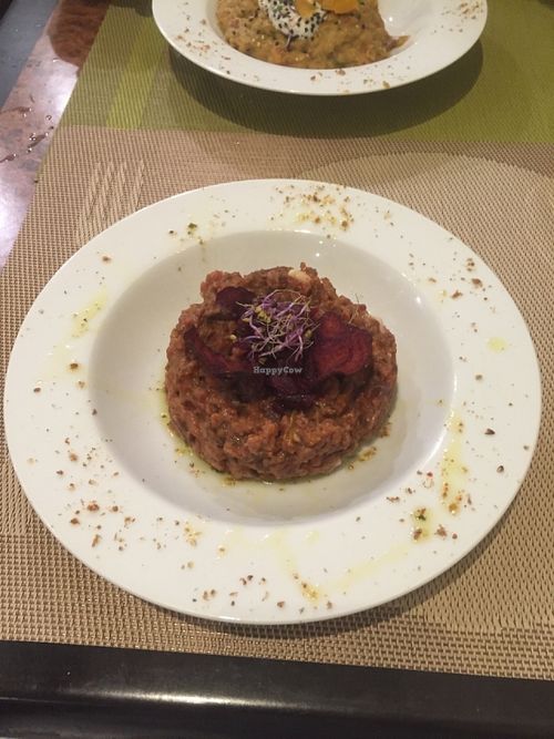 Beet risotto w/ beet chip garnish at Yanten Veggie Bar in Madrid