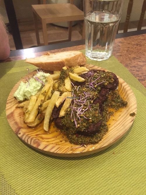 Home made seitan chorizo with chimichurri sauce, French fries and vegan aioli at Yanten Veggie Bar in Madrid