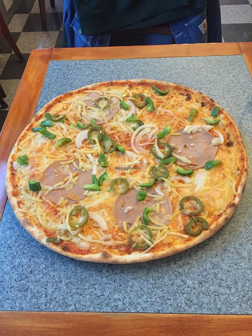 Massive pizzas  at Kungsholmens Pizza & Deli in Stockholm