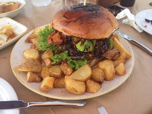 Veggie burger with potato wedges at Namaste in Gialova