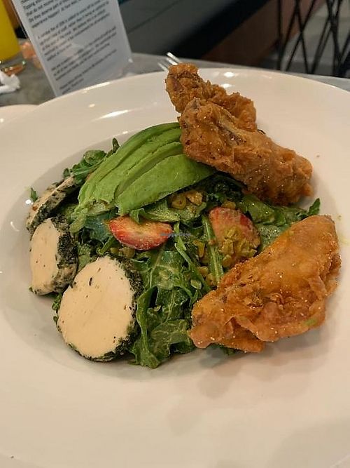 Summer salad with wings at Sticky Fingers Diner in Washington