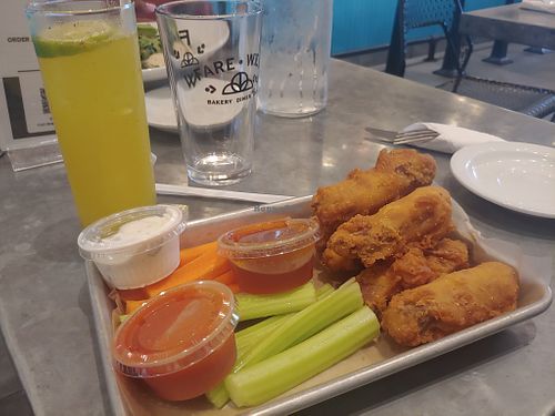 Wings with sauces and Turmeric mocktail at Sticky Fingers Diner in Washington