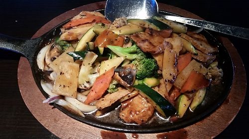 Sizzling vegis & shot protein in black-bean sauce at Bayberry Vegan Cafe in Woburn