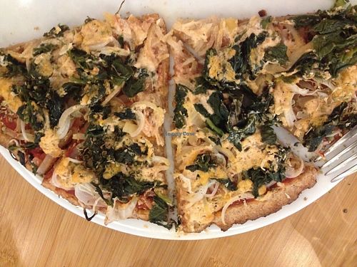 Spinach and onion vegan pizza at Zodiac Pizza in Munich