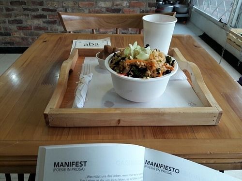 big paella with plantein and juice at Aba Opción Vegetariana in Bogota