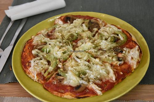 Mushroom and avocado pizza with VioLife cheese at Green Beans in Lisbon