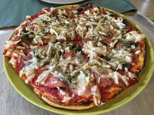 Bacon and mushrooms pizza at Green Beans in Lisbon