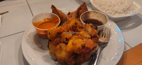 Takeout: potatoes/ spinach with samosas at Saravana Palace in Fairfax