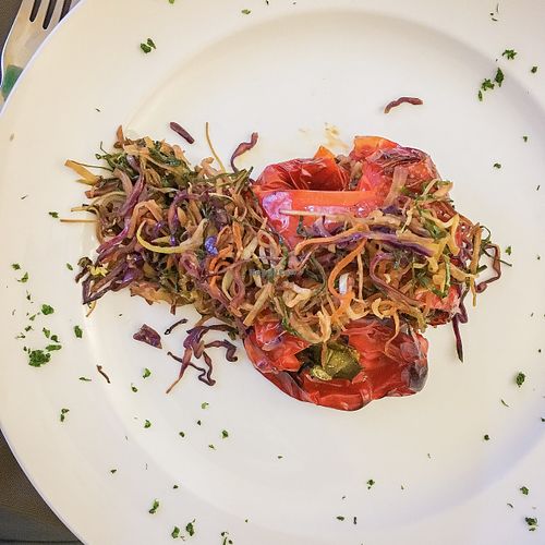 roasted red pepper stuffed with wild rice, topped with sautéed veggies at Olives Restaurante in Funchal