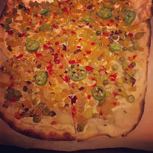 Vegan pizza with almond lemon ricotta, caponatina vegetables and Serrano peppers  at Wynn Hotel - Allegro in Las Vegas