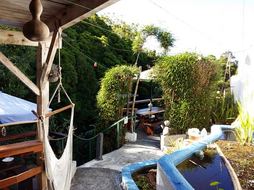 Outdoor seating at O Esconderijo in Faial