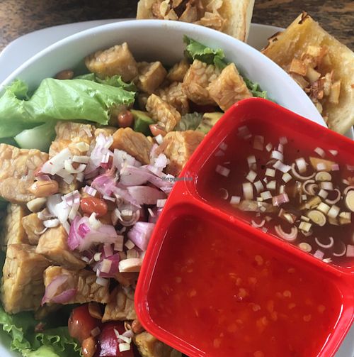 tempe salad (comes with garlic bread) - so good! at Bali Maitreya Cafe in Lembongan