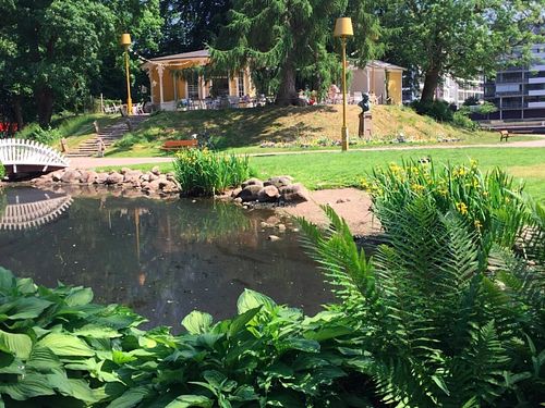 The building and the lake outside the café at Kafe Rotundan in Halmstad