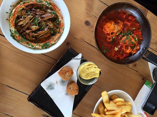 hummus with vegan shumbara, vegan bitterballen (we couldn't wait) plus the roasted pepper egg dish   at Traffic in Amsterdam