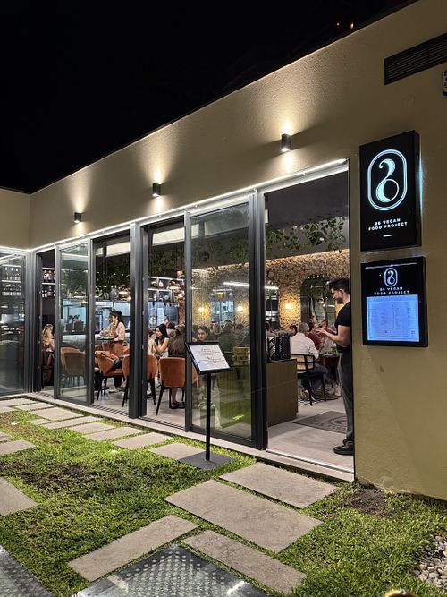 View from outside (down a flight of stairs from the street)  at 26 Vegan Food Project in Lisbon