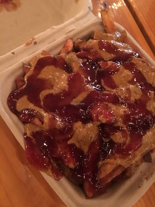 The famous PB&J fries with house cut, double fried potatoes, satay and smoky chipotle raspberry sauce at Potato Champion - Food Truck in Portland