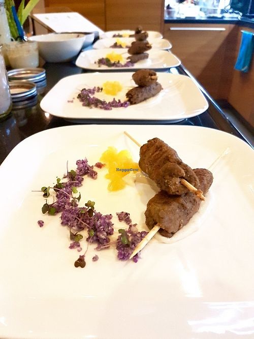 Lentil Kofta on lemon macadamia cream, purple cauliflower, mandarin, microgreen.  at Vegan Supper Club Bangkok in Bangkok