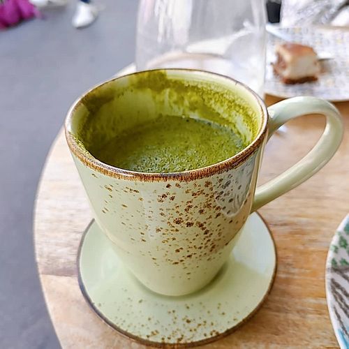 Matcha latte with oat milk and agave at Sweet Rawmance in Paris
