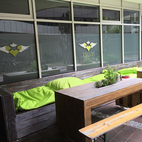 outside at Rebella Bex Cafe in Munich