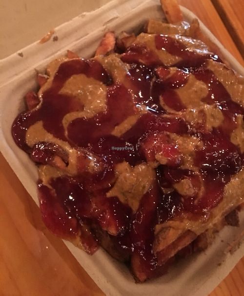 The famous PB&J fries-Hand cut fries, homemade satay and smoky raspberry chipotle sauces. So good at PBJ Grilled - Food Truck in Portland