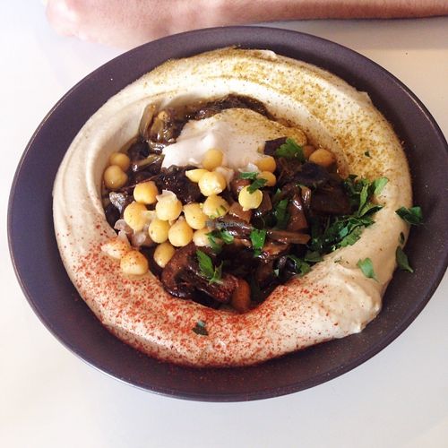 Hummus with portobello - highly recommended! at Umm Kulthum in Haifa