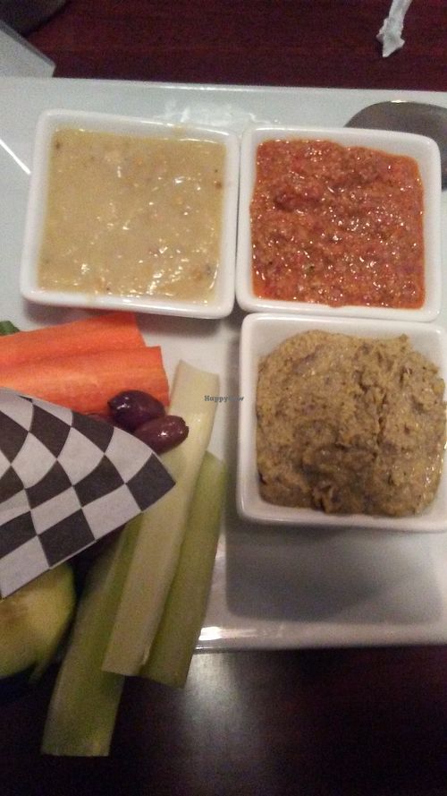 Combo appetizer 
Hummus
Baba Ganoush
Muhammara at Guernsey Kitchen in Cambridge