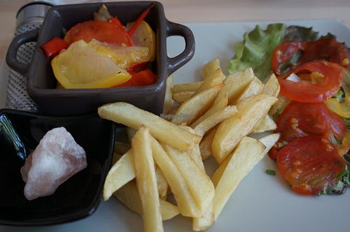 French fries with baked summer vegetables at Green Rainbow in Paris