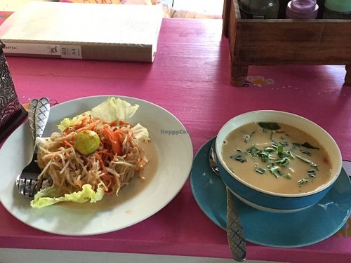 Papaya salad on left, Tom Yam soup on right  at Bodhi Tree Cafe in Chiang Mai