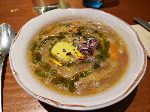 Main: ramen (more of a tangy noodle soup with Heura pb chickn) at La Encomienda in Madrid