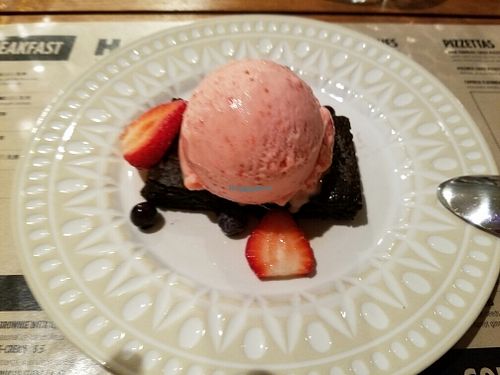 Vegan strawberry ice cream with vegan brownie  at Holi Vegan Kitchen in North Miami Beach