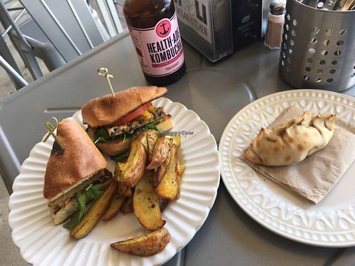 corn empanadas with jerk tempeh panini at Holi Vegan Kitchen in North Miami Beach