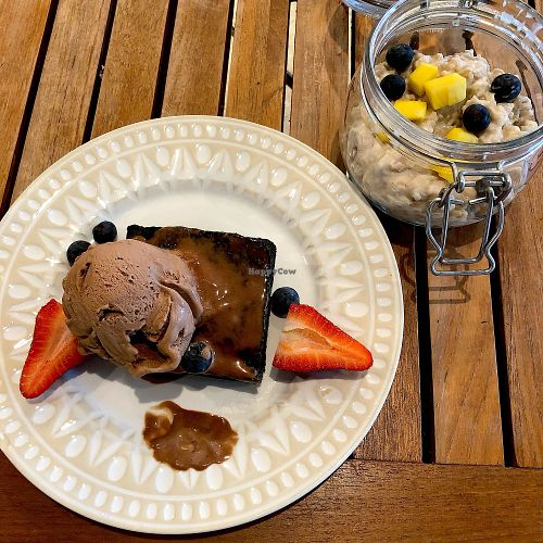 Brownie with ice cream and coconut rice pudding at Holi Vegan Kitchen in North Miami Beach