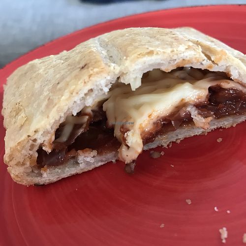 Sfogliatina tomatoes onions and vegan cheese  at Wani Vegan Bakery in Rome