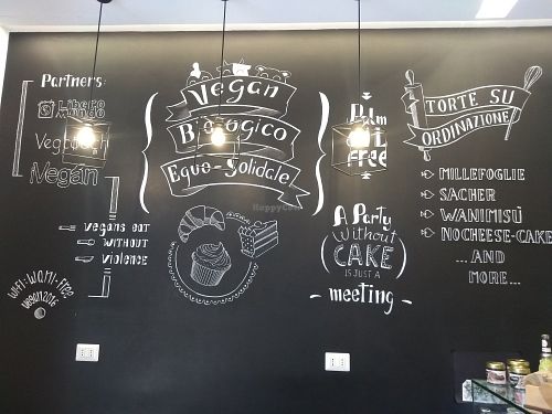 Their left wall at Wani Vegan Bakery in Rome