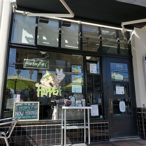 Right on 4th St across from the parking lot at The HipPea in Long Beach