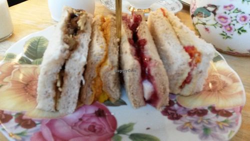 Vegan cheese and caramelised onion, curried vegetable, vegan cranberry cheese with cranberry sauce and hummus and roasted red peppers sandwiches. at The Great British Cupcakery in Newcastle Upon Tyne