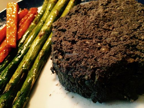 lentil steak and glazed asparagus and carrots - protein made of local green lentils, short grain brown rice, black tahini, parsley, sage, and balsamic vinegar.  all ingredients are organic, made to your taste, and the lentils are local!   at Panda's Kitchen in Denver