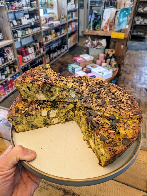 Freshly baked farinata 😋. Gram flour used - no egg! With mushrooms, leek, tofu and dulse. The best! at Sprout Health Foods in Newquay