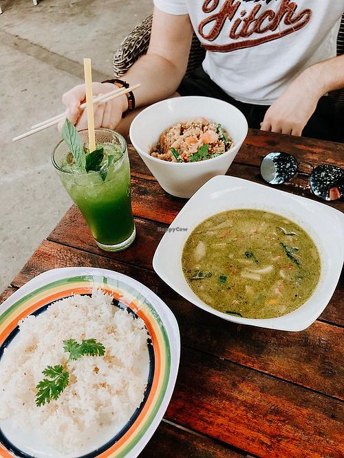 Green thai curry with tofu, fried rice with mushrooms, basil drink at Surfing Birds Wok in Mui Ne