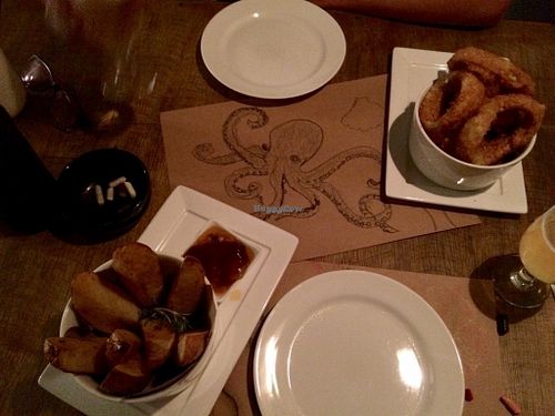 Oignon rings + rustic potatoes at Mooo in Recife