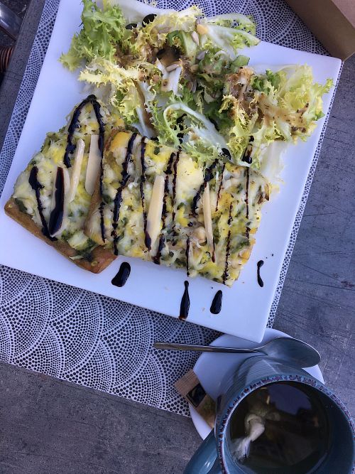 creamy pizza slices w/ green pesto at L'Eden Sans Gluten in Strasbourg