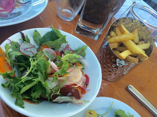 Starter salad & crispy fries! at Restaurang Sand in Bastad