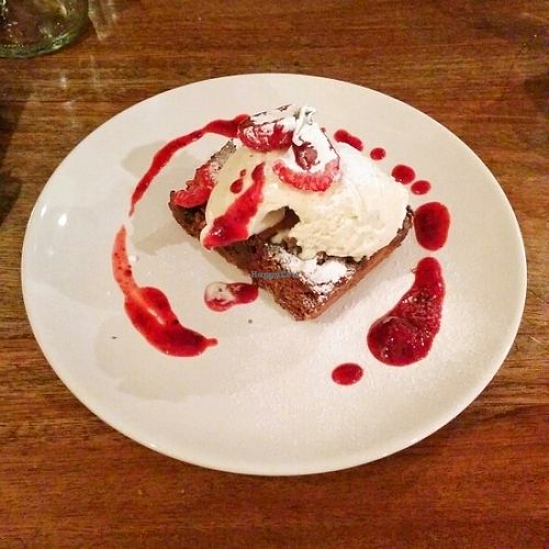 Chocolate brownie with vegan icecream at Fusca  in Warwick