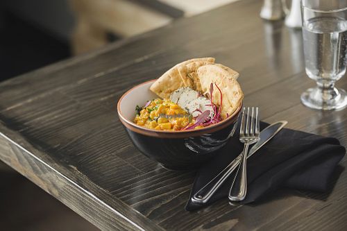 Come taste our Cari Coco Kale bowl at Restaurant L'Odika in Drummondville