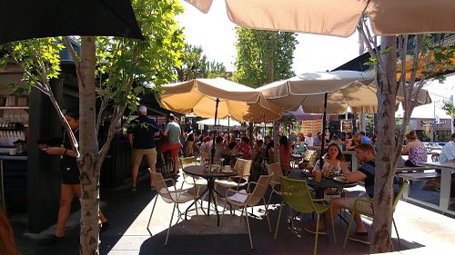 Outdoor patio. Note sign of trail crossings in right background. at McCoy's Public House in Kansas City