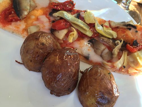 vegan pizza and rustic potatoes  at Zizzi in Newcastle Upon Tyne