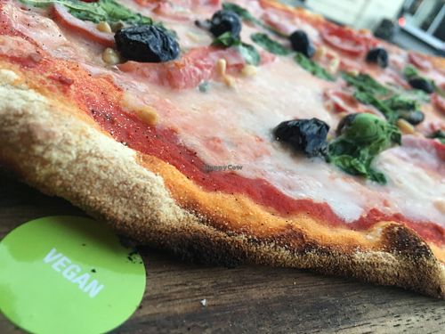 Vegan pizza clearly marked to ensure no mix ups in cooking or delivery  at Zizzi in Bishops Stortford