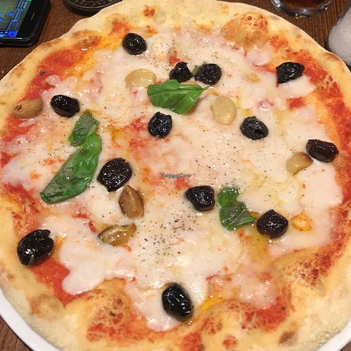 vegan pizza with olives and roasted garlic at Zizzi - Bristol Cabot Circus  in Bristol