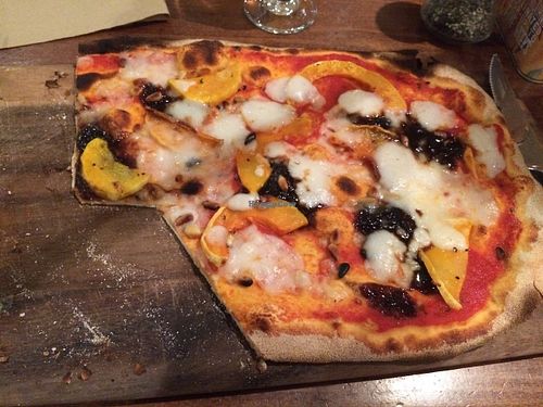 Vegan Rustica Margherita pizza with butternut squash, pine nuts and caramelised balsamic onions. Yum! at Zizzi - Clifton Village in Bristol